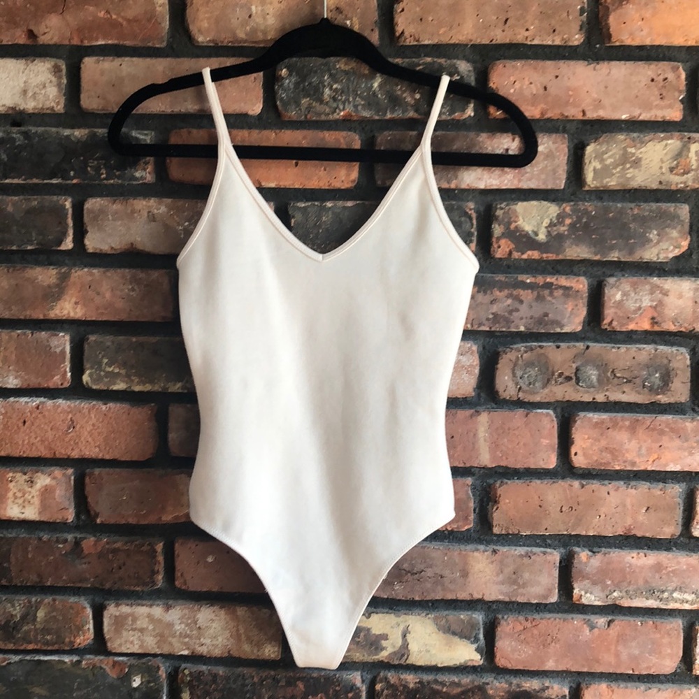 XS Cream bodysuit from Aritzia